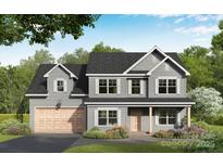 Charming two-story home featuring a craftsman style, gray siding, covered entry, and two-car garage at 1146 Nations Dr, Charlotte, NC 28217
