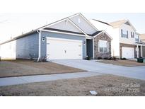 Charming single-Gathering home featuring a two-car garage and stone facade at 1949 Vanderlyn St, Monroe, NC 28112