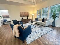 Sun-drenched living room featuring modern furniture and stylish decor at 2194 Lannie Ln, Rock Hill, SC 29730