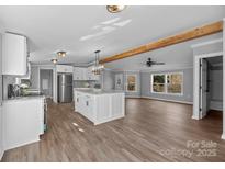 Modern kitchen with granite counters, large island, stainless steel appliances and lots of natural light at 1254 Raxter Rd, Edgemoor, SC 29712