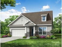 Charming single-Gathering home with stone accents, covered entryway, and attached two car garage at 3009 Bent Willow Dr # 160, Indian Trail, NC 28079