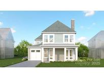 Charming two-story home featuring a cozy front porch, dormer, and a well-maintained lawn at 7459 Fighting Creek Rd # 33, Sherrills Ford, NC 28673