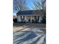 Charming single-story home with a covered porch and inviting curb appeal at 400 Martin Luther King Jr Ave, Kannapolis, NC 28083