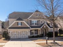 Traditional two-story home with attached two-car garage and manicured landscaping at 83202 Cortland Dr, Lancaster, SC 29720