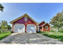 Charming single Gathering home with a two car garage and a well manicured lawn at 7102 Lanark Ct, Charlotte, NC 28217