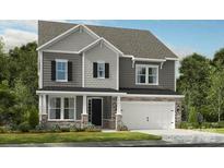 Charming two-story home featuring stone accents, gray siding and a two-car garage at 177 Glenn Dr, Mooresville, NC 28115