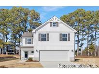 Charming two-story home with white siding, gray shutters, and a well-manicured front yard at 159 Mooring Dr # 342Pp, Statesville, NC 28677