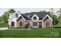 Charming home with a mix of siding and brick, complemented by a lush green lawn at 3701A Windy Rd # 5, Concord, NC 28027