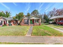 Charming brick home with a cozy front porch and well-maintained lawn at 441 Willowbrook Ave, Rock Hill, SC 29730