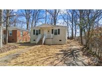 Charming single-story home featuring a well-maintained front yard and inviting entrance at 2640 Olando St, Charlotte, NC 28206