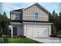 Two-story home with gray and white siding, attached two-car garage, and nicely manicured lawn at 1100 Harry Ct, Albemarle, NC 28001