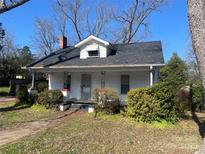 Charming single-Gathering home with a quaint front porch, and partial landscaping at 437 & 437 1/2 Hope St, Rock Hill, SC 29730