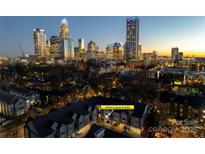 Night aerial view of condo community with a beautiful skyline of the city at 509 N Graham St # 2D, Charlotte, NC 28202