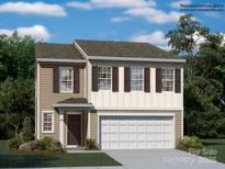 Charming two-story home with a two-car garage, featuring a welcoming front door at 2955 Legacy Ridge Ln, Catawba, NC 28609