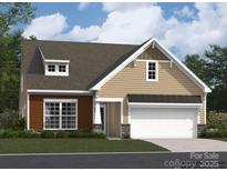 Charming home featuring a two-car garage, stone accents and complementary siding at 2817 Morning Song Way, Lancaster, SC 29720