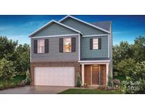 Charming two-story home featuring a brick and siding exterior, complemented by a two-car garage at 8043 Plymouth Rd, Sherrills Ford, NC 28673