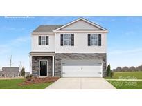 Two-story home featuring stone accents, a two-car garage, black shutters, and a well-manicured lawn at 8043 Plymouth Rd, Sherrills Ford, NC 28673