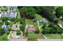 Aerial view of property showing lot size with mature trees and landscaping at 9808 Washam Potts Rd, Cornelius, NC 28031