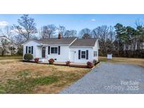 Charming single story house with white siding and fresh landscaping at 3606 Buffalo Shoals Rd, Newton, NC 28658