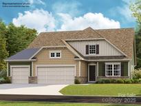 Charming two-story home featuring a three-car garage, neutral color palette, and covered front entry at 4122 Camden Glen Rd, Lancaster, SC 29720