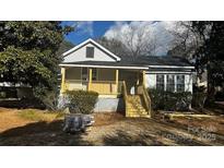 Charming single-story home featuring a covered front porch and well-maintained landscaping, offering great curb appeal at 315 Confederate St, Fort Mill, SC 29715