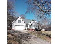 Charming single-story home with a well-manicured lawn and an attached garage in a quiet neighborhood at 1200 Craig Ave, Lancaster, SC 29720