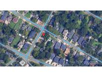An aerial view of a neighborhood showing the property's location at 1400 Downs Ave, Charlotte, NC 28205
