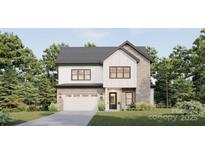 New construction featuring a two-story home with a brick and white siding exterior and attached garage at 00A Old Pardue Rd, Lancaster, SC 29720