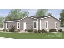 Charming single-story home with gray siding, well-manicured lawn, and colorful rose bushes at 2013 Vick Wilson Rd, Shelby, NC 28152