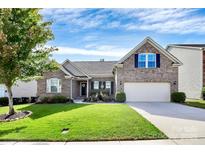 Charming brick home with well-manicured lawn and inviting curb appeal at 7343 Mill Ruins Sw Ave, Concord, NC 28025