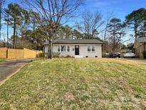 Charming single-story home with a well-maintained lawn and inviting entrance at 3524 Clardy Ct, Charlotte, NC 28205