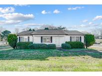 Charming single-story home with landscaped front yard and classic curb appeal at 1022 Kannapolis Pkwy, Concord, NC 28027