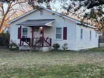 Charming one-story home with a cozy front porch and red accents at 374 Baker St, Rock Hill, SC 29730