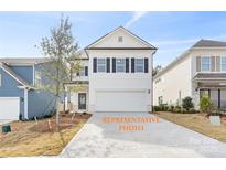 Charming two-story home with a two car garage and classic black shutters at 1101 Red River Dr, Salisbury, NC 28144