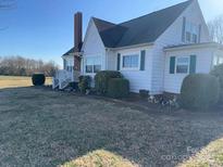 Charming home featuring a traditional design with well-maintained landscaping and a welcoming curb appeal at 3417 Crowder Ridge Rd, Shelby, NC 28150