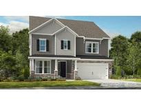 Charming two-story home features a welcoming entrance, stone accents, and an attached two-car garage at 136 Glenn Dr, Mooresville, NC 28115