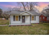 Charming one-story home with a cozy front porch and classic curb appeal at 1893 Hilltop Cir, Gastonia, NC 28054