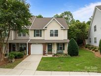 Charming two-story home with a well-manicured lawn and inviting curb appeal at 2592 Brackley Nw Pl, Concord, NC 28027