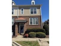 Charming brick-and-siding townhouse with a covered entrance and well-maintained landscaping at 8410 Scotney Bluff Ave, Charlotte, NC 28273