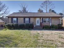 Charming brick home with well-maintained landscaping and inviting front entrance at 1120 Glenarden Dr, Rock Hill, SC 29730