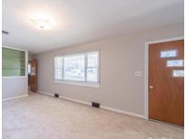 Bright living room featuring neutral walls and a large window for plenty of light at 2310 Clay St, Kannapolis, NC 28083