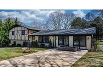 Charming two-story home with a manicured lawn, inviting walkway, and neutral exterior paint at 2530 31St Street Ne Dr, Hickory, NC 28601