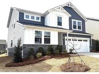 Beautiful two-story home featuring gray siding, white accents, and a two-car garage at 9930 Cask Way, Huntersville, NC 28078