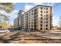 A modern condominium with large windows and small balconies on a sunny day with ample parking at 211 Heritage Blvd # 612, Fort Mill, SC 29715