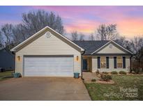 Charming single-story home featuring a two-car garage and manicured lawn, perfect for suburban living at 839 Prestwick Dr, Rock Hill, SC 29730