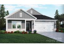 Charming home with gray siding, white trim, two-car garage, and well-manicured lawn at 155 Aberdeen Dr, Salisbury, NC 28144