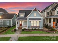 Charming home showcasing the beautiful curb appeal, landscaping, and craftsman-style design at 917 Herrons Ferry Rd, Rock Hill, SC 29730