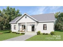 Charming exterior featuring vertical siding, a gray metal roof, a covered entry porch and a well-manicured lawn at 1469 32Nd Sw St, Hickory, NC 28602