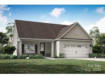 Charming single-story home with a two-car garage, neutral siding and well-maintained landscaping at 159 Wembury Ln, Troutman, NC 28166
