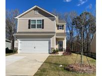 Charming two-story home featuring a spacious two-car garage and beautifully maintained front yard at 3540 Clover Valley Dr, Gastonia, NC 28052